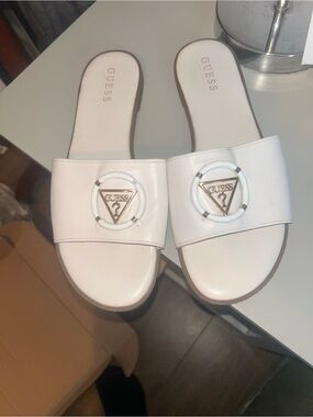 GUESS White Slide Sandals with Gold Triangle Logo